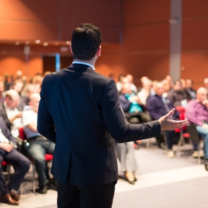 Speaker at Business Conference and Presentation. Audience at the conference hall.